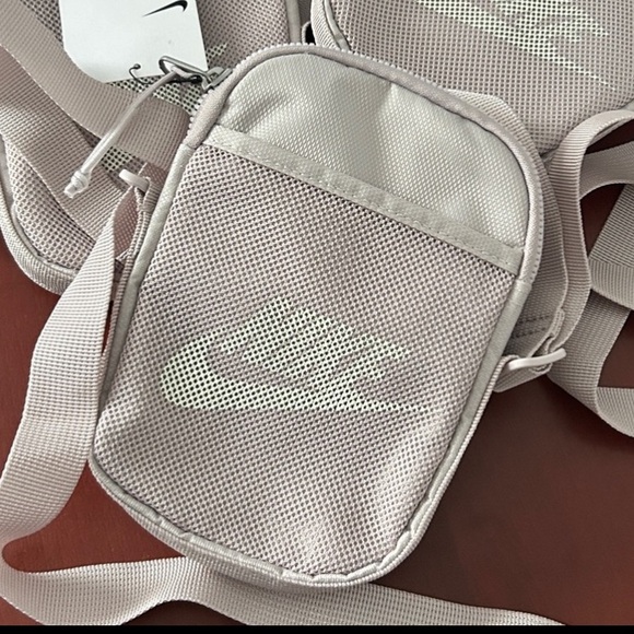 Nike Handbags - Nike Blush Pink Mini Crossbody Bag